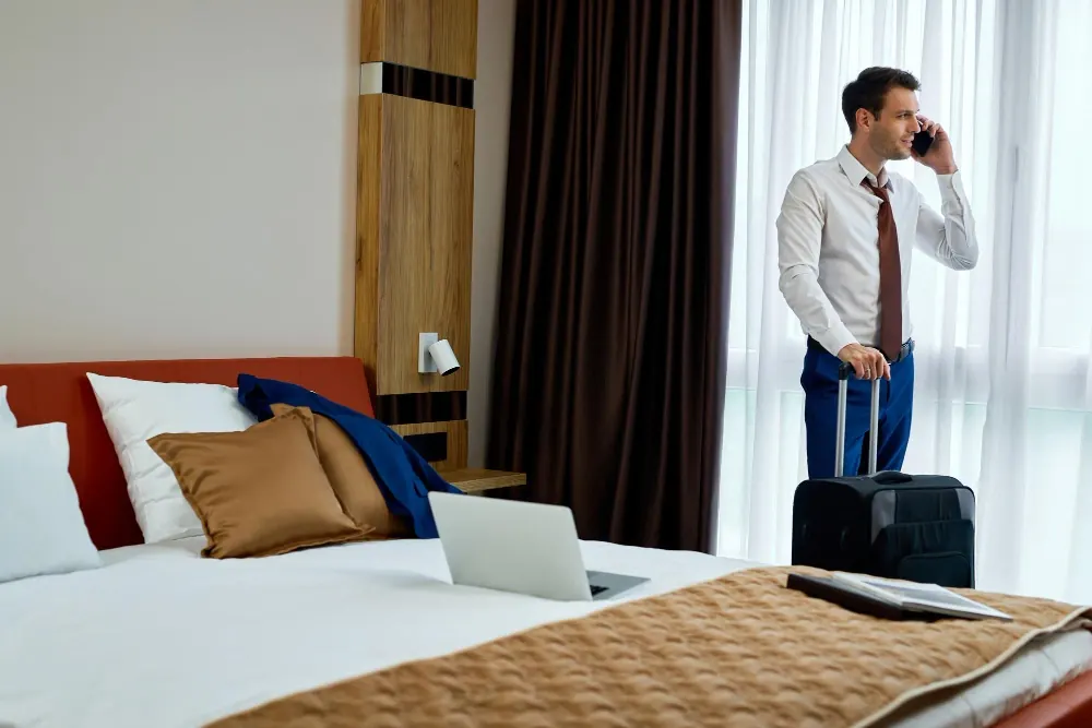 man-standing-in-a-hotel-room