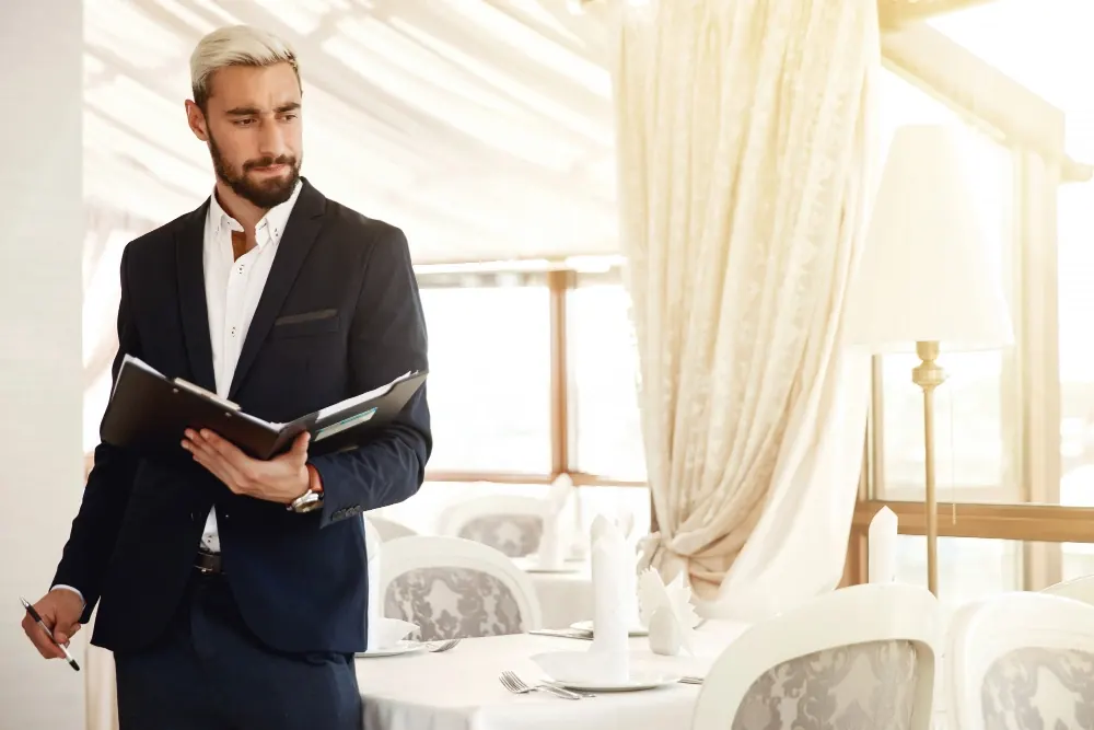 Hotel revenue manager evaluating RMS software options