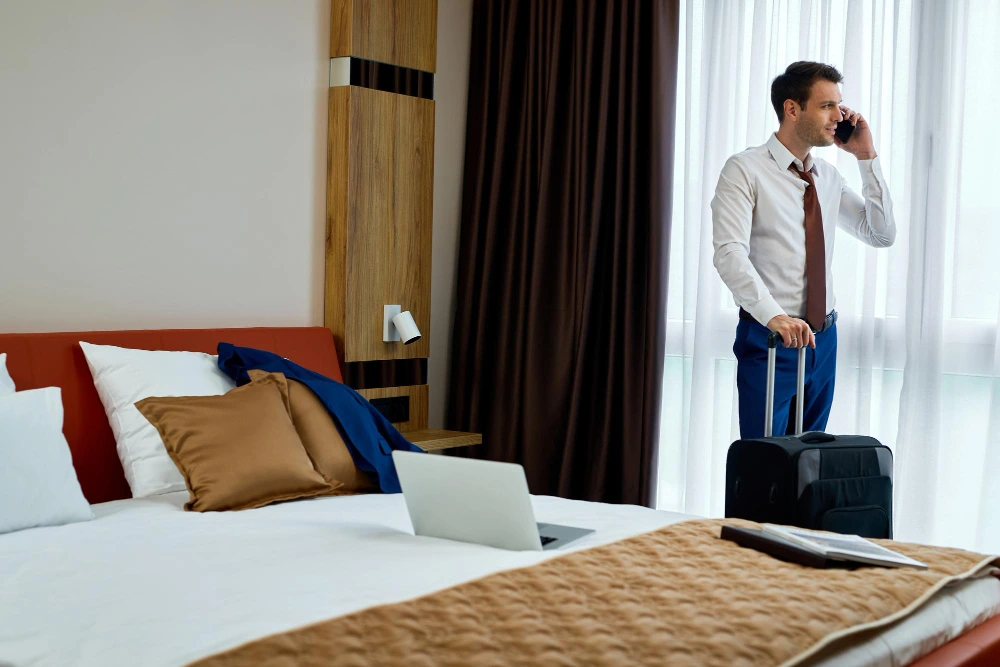 man-standing-in-a-hotel-room