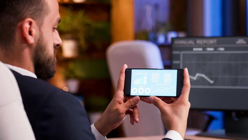 man-reviewing-hotel-revenue-statistics